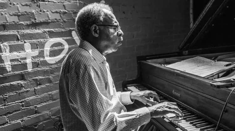 Billy, a cancer survivor, playing the piano