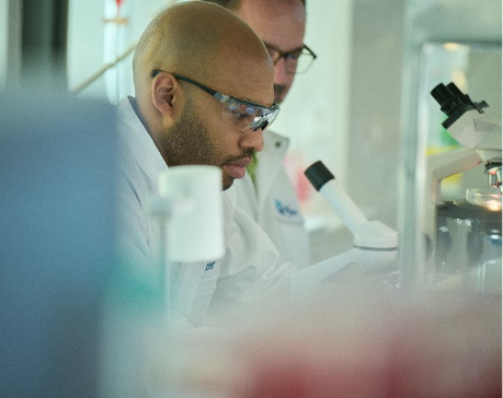 Actor portrayal of scientists working together in a laboratory setting